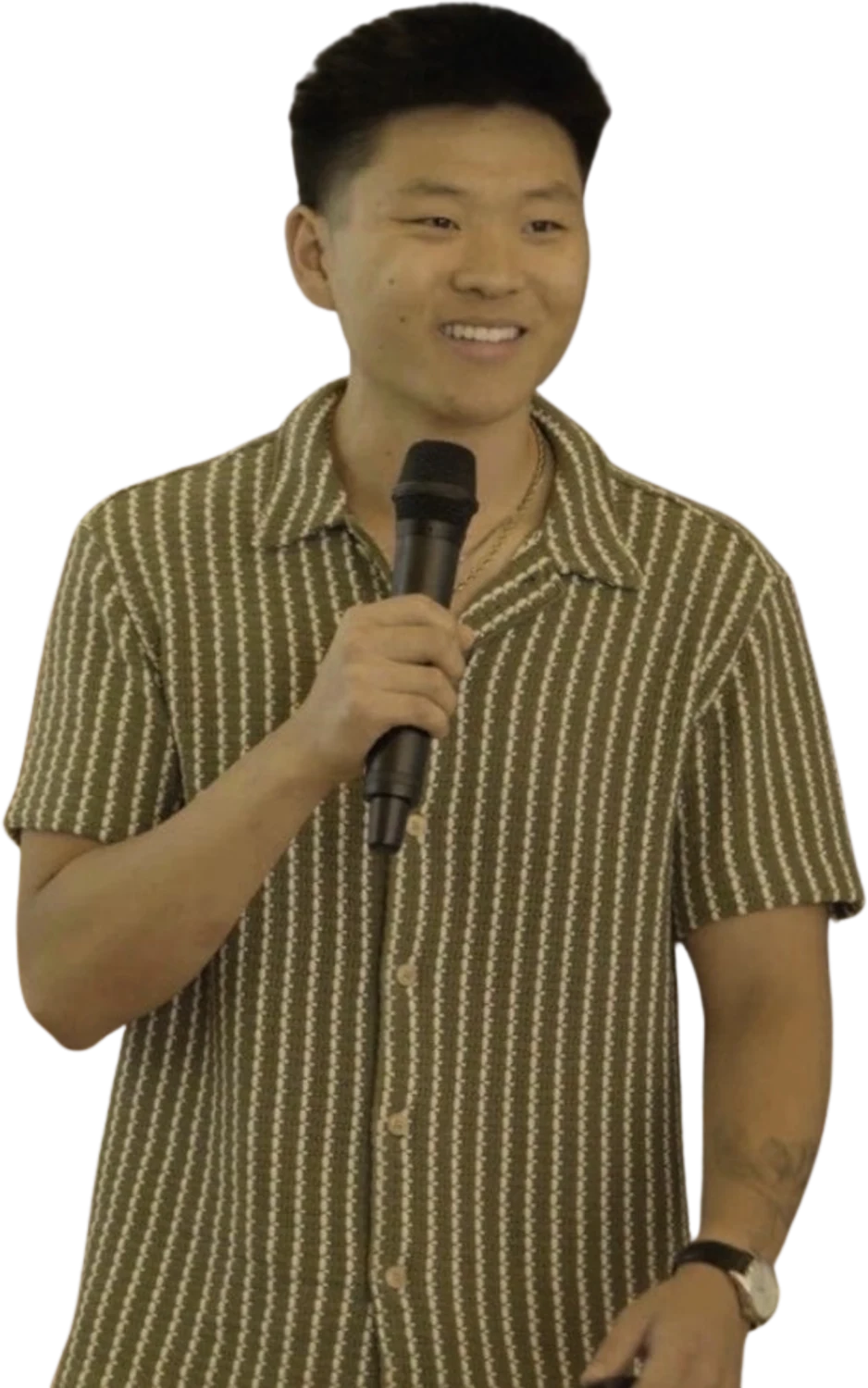 Nate Herk speaking into a microphone.